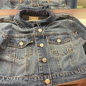 Cute jean jacket really nice material never worn
